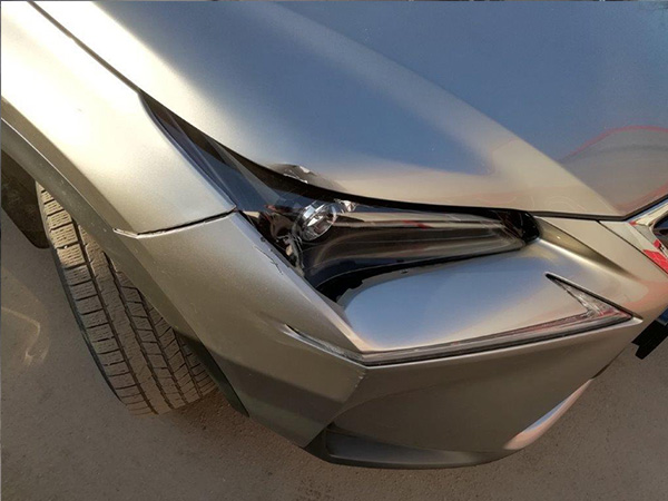 Кузовной ремонт Lexus NX200. Автомобиль на осмотре повреждений